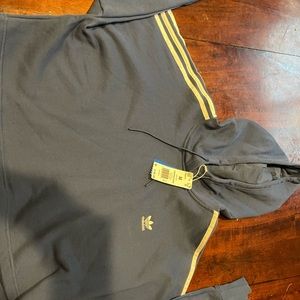 Brand new cropped adidas hoodie. Super cute!